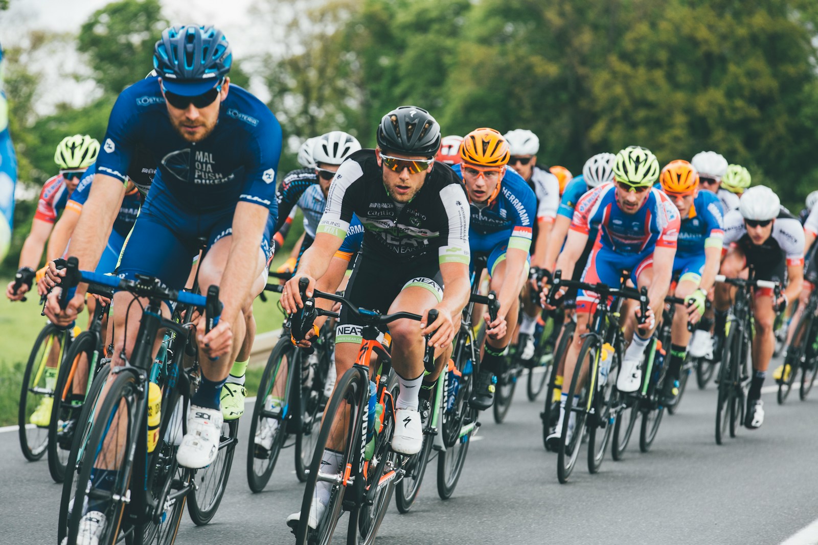 Photo by Markus Spiske group of cyclist on asphalt road